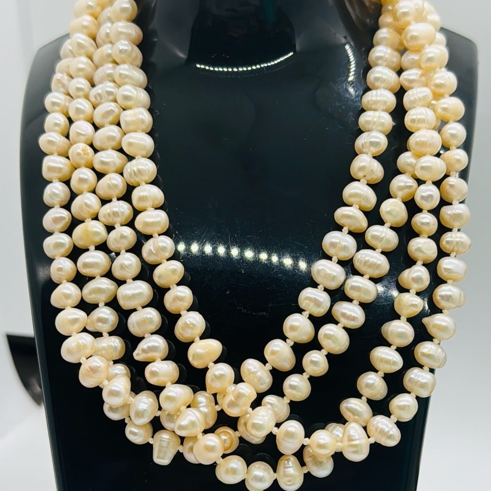 63 inches of Vintage dusty pink genuine baroque pearls.​